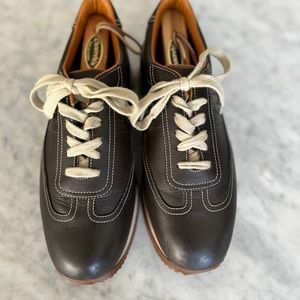 Hermes. Rich chocolate brown lace up sneaker. The epitome of style.